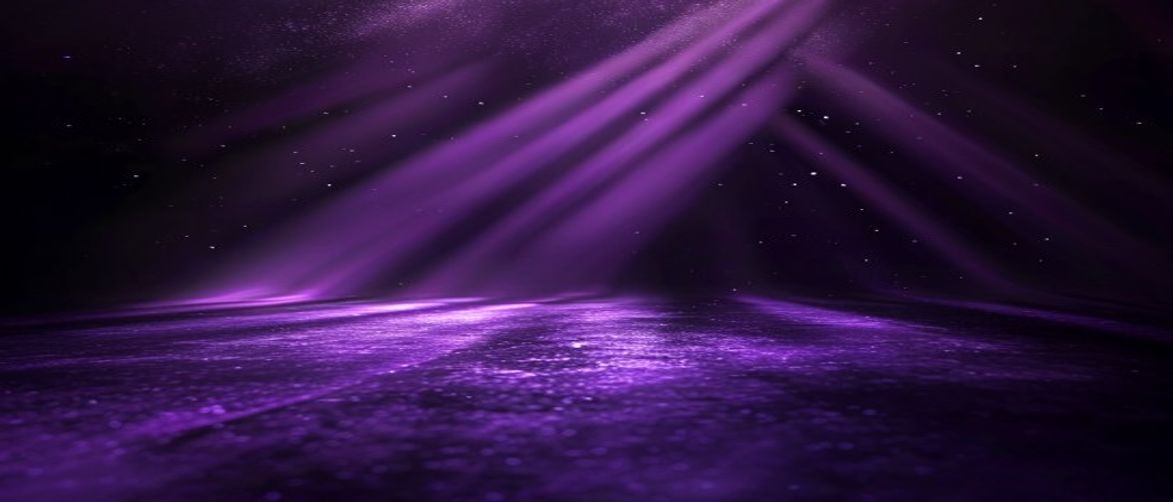 Cinematic violet light beams sweeping across a dark textured studio surface